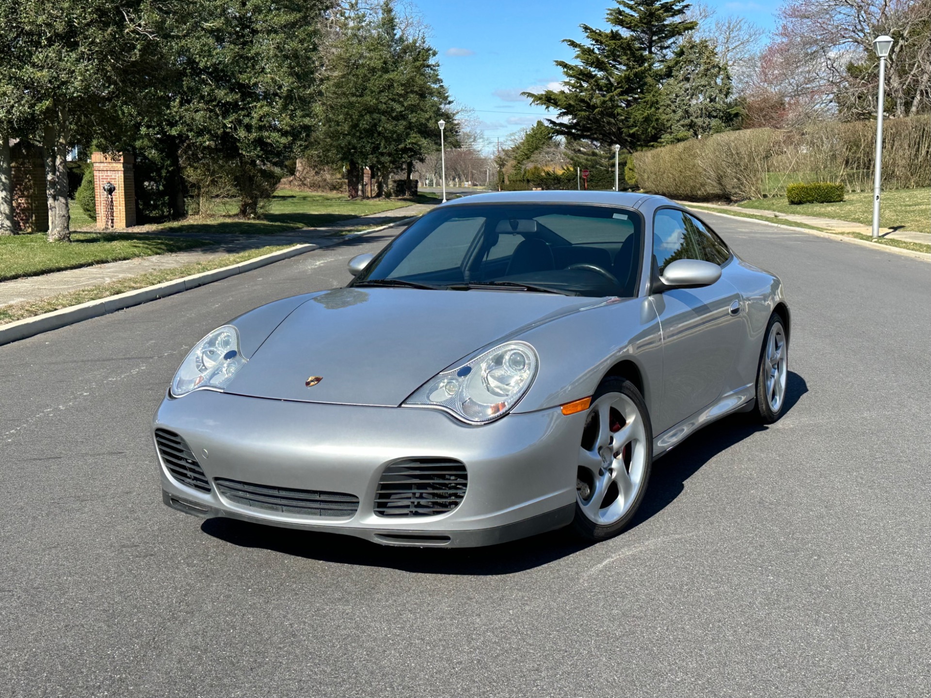 thumbnail image 2 of Genuine Porsche 996 Carrera 4S Rear Badge – Silver Emblem – New OEM 2 of 6